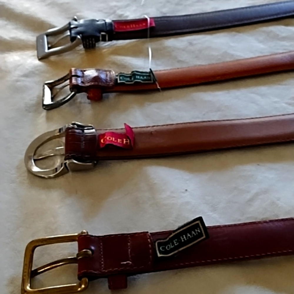 4 Cole Haan leather belts, 2 42 and 1/2 " bucket to tip, and 2 42" buckle to tip